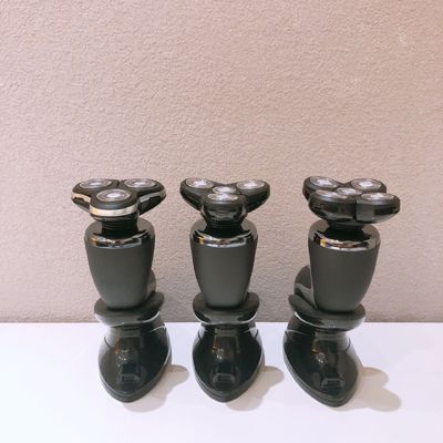 Barbeador elétrico portátil masculino com lâmina de aço inoxidável e cabo de plástico para uso facial